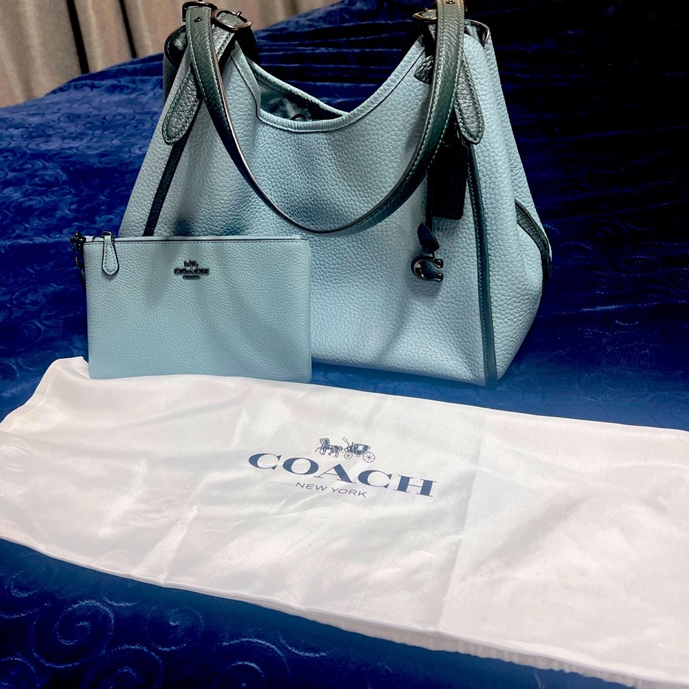 Gently used Coach shoulder bag with matching wristlet. Smoke free home
